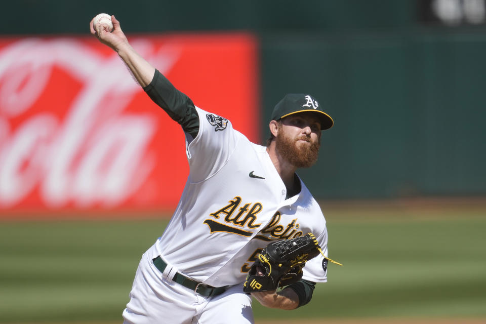 Oakland Athletics pitcher Paul Blackburn works against the San Francisco Giants during the first inning of a baseball game in Oakland, Calif., Saturday, Aug. 5, 2023. (AP Photo/Jeff Chiu)