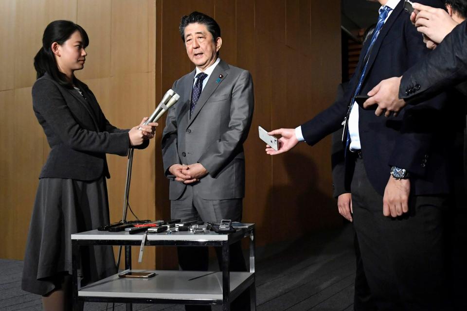 Japanese Prime Minister Shinzo Abe speaks to reporters at the prime minister's official residence in Tokyo, Feb. 21, 2020.