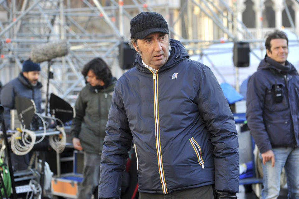 FILE - This Jan. 12, 2016 file photo shows Italian director Paolo Sorrentino on the set of his TV series "The Young Pope", featuring actor Jude Law, in Venice's St. Mark's Square in Italy. The 10-episode series premieres Sunday, Jan. 15, 2017 on HBO. (AP Photo/Luigi Costantini, File)