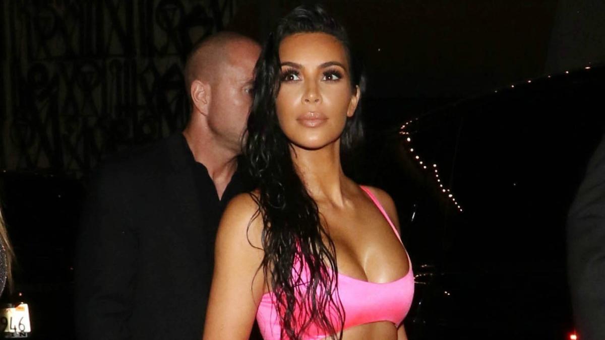 Kim Kardashian Lives Her Best Boat Life in Body-Hugging Neon Pink Outfit