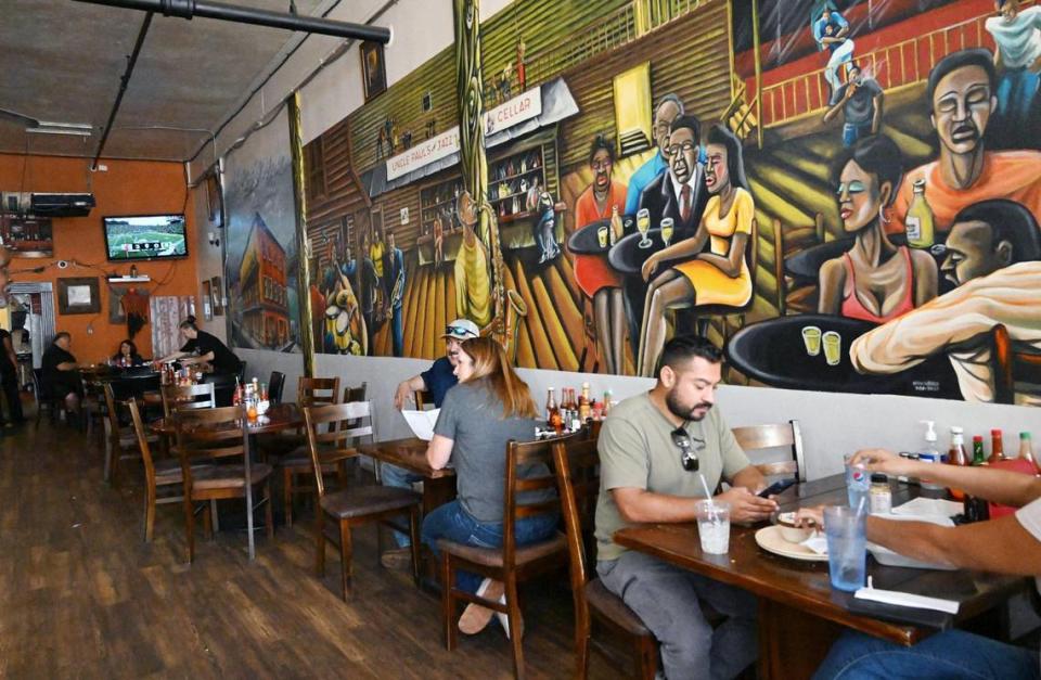 Chef Paul’s Cafe, with colorful murals inside, offers popular highly-rated soul food in Chinatown, photographed Saturday, Oct. 21, 2023 in downtown Fresno.