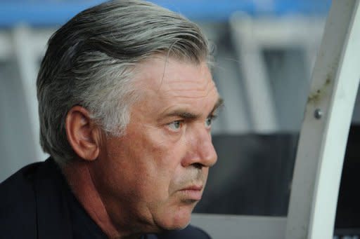 Paris Saint-Germain's head coach Carlo Ancelotti watches the friendly match of his team against Barcelona on August 4. After another summer of big spending, season two of the Qatar Sports Investment five-year plan to take PSG to the summit, in France and abroad, sees the capital club billed as the overwhelming favourites to claim the Ligue 1 crown