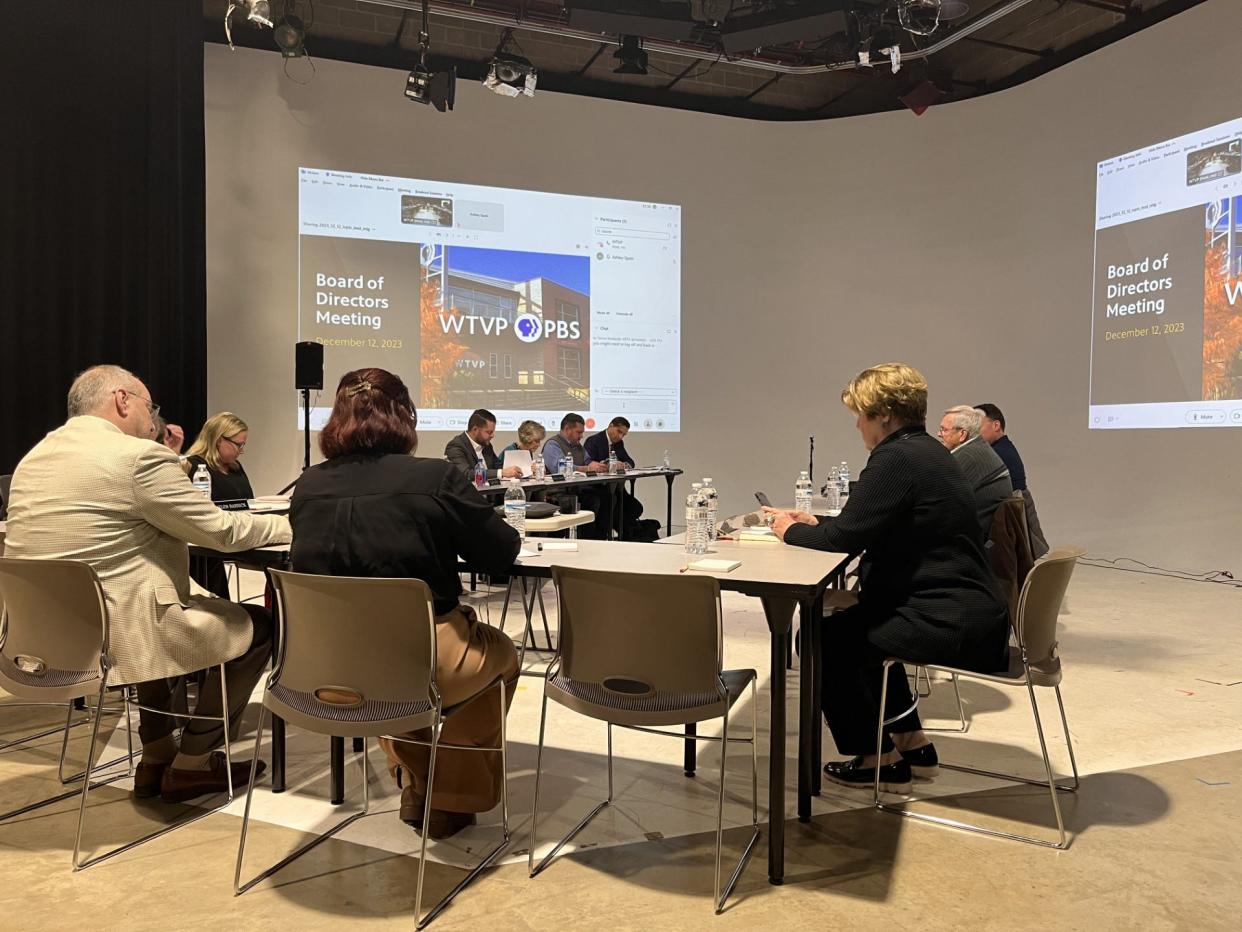 Members of the WTVP Board of Directors prepare for their meeting on Dec. 12, 2023. The board has been navigating financial controversies at WTVP for months.