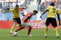 <p>Belgium’s Eden Hazard, left, and England’s John Stones challenge for the ball during the third place match between England and Belgium at the 2018 soccer World Cup in the St. Petersburg Stadium in St. Petersburg, Russia, Saturday, July 14, 2018. (AP Photo/Natacha Pisarenko) </p>