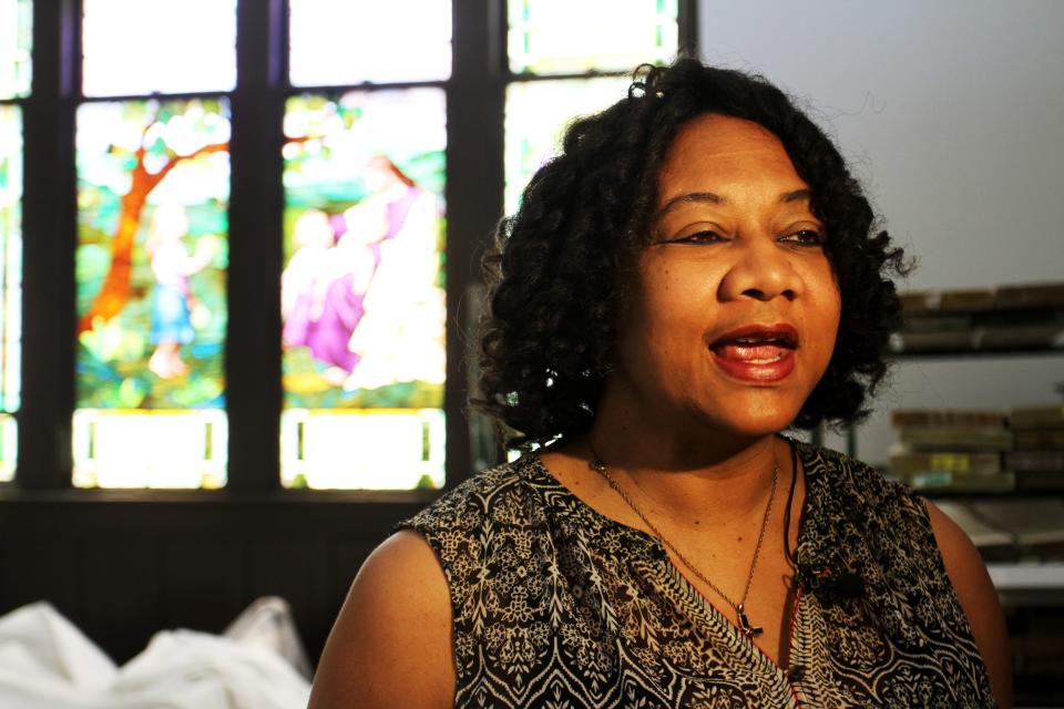 Longtime congregation member Charlotte Hardin speaks with reporters in the Pitts Chapel United Methodist Church, which received a $10,000 historic preservation grant from the National Society of the Daughters of the American Revolution.