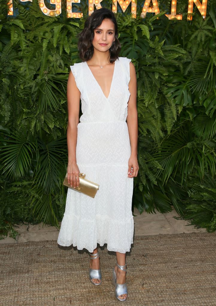 <p>Nina Dobrev wears a white Altuzarra dress to the second annual Maison St-Germain on July 10, 2018, in Malibu, Calif. (Photo: JB Lacroix/ WireImage) </p>