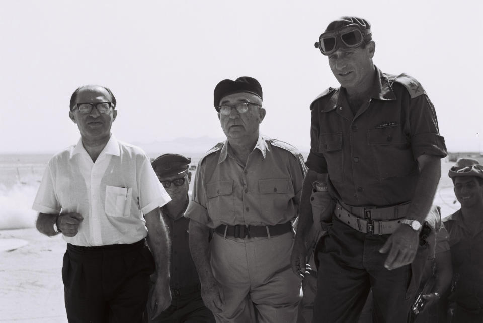 In this June 13, 1967 photo provided by the Wiesenthal Center, Prime Minister Levi Eshkol, center, accompanied by Minister Menachem Begin, left, and O.C. Southern Commander Aluf Gavish visit troops in the Sinai. The photograph is included in the documentary film, "The Prime Ministers." The Wiesenthal Center’s Oscar-winning film division, issues its 13th historical movie, "The Prime Ministers," on Nov. 6, 2013. (AP Photo/Wiesenthal Center, Israel National Photo Library, Moshe Milner)