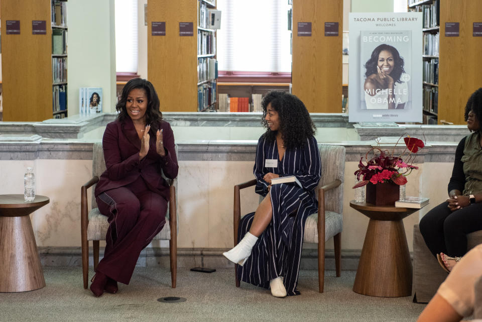 Wearing a maroon Rosetta Getty&nbsp;suit to attend a book club meeting in Tacoma, Washington, on March 24.