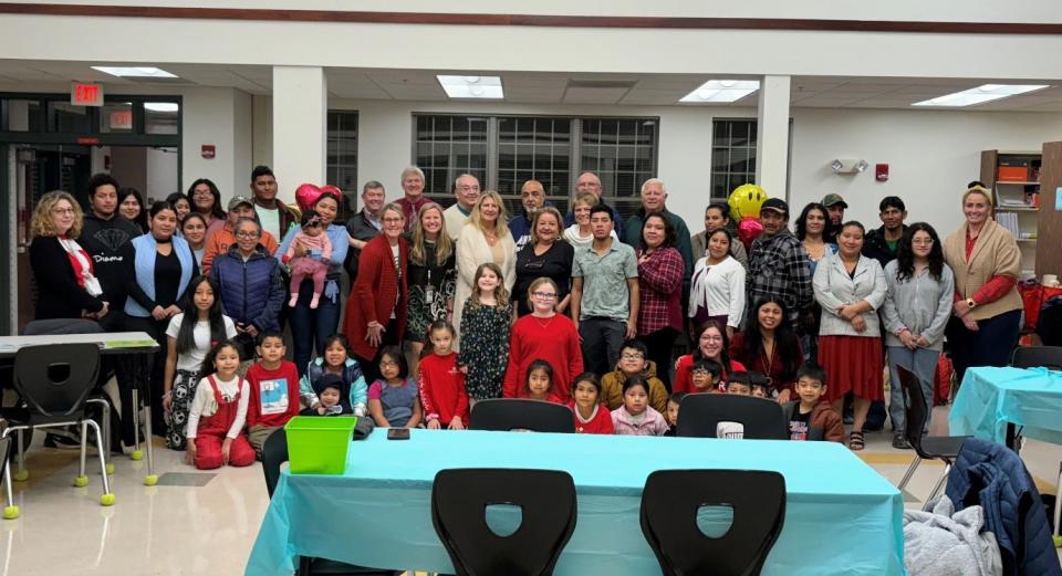 Picture includes the Morales-Leon family, Mejia-Lopez family, Barrientos Duran family, Cash Mejia family, Cabrera-Icte family, Velazquez family, Martinez Ovando family, Martinez family and the Contreras Vasquez family with John M. Clayton teachers and administrators as well as supportive community members celebrating the final class of JMC’s Latino Family Literacy Program.