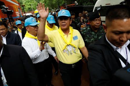 FILE PHOTO: Thailand's Prime Minister Prayut Chan-o-cha waves as he arrives at the Tham Luang cave complex during an ongoing search for members of an under-16 soccer team and their coach, in the northern province of Chiang Rai, Thailand, June 29, 2018. REUTERS/Soe Zeya Tun