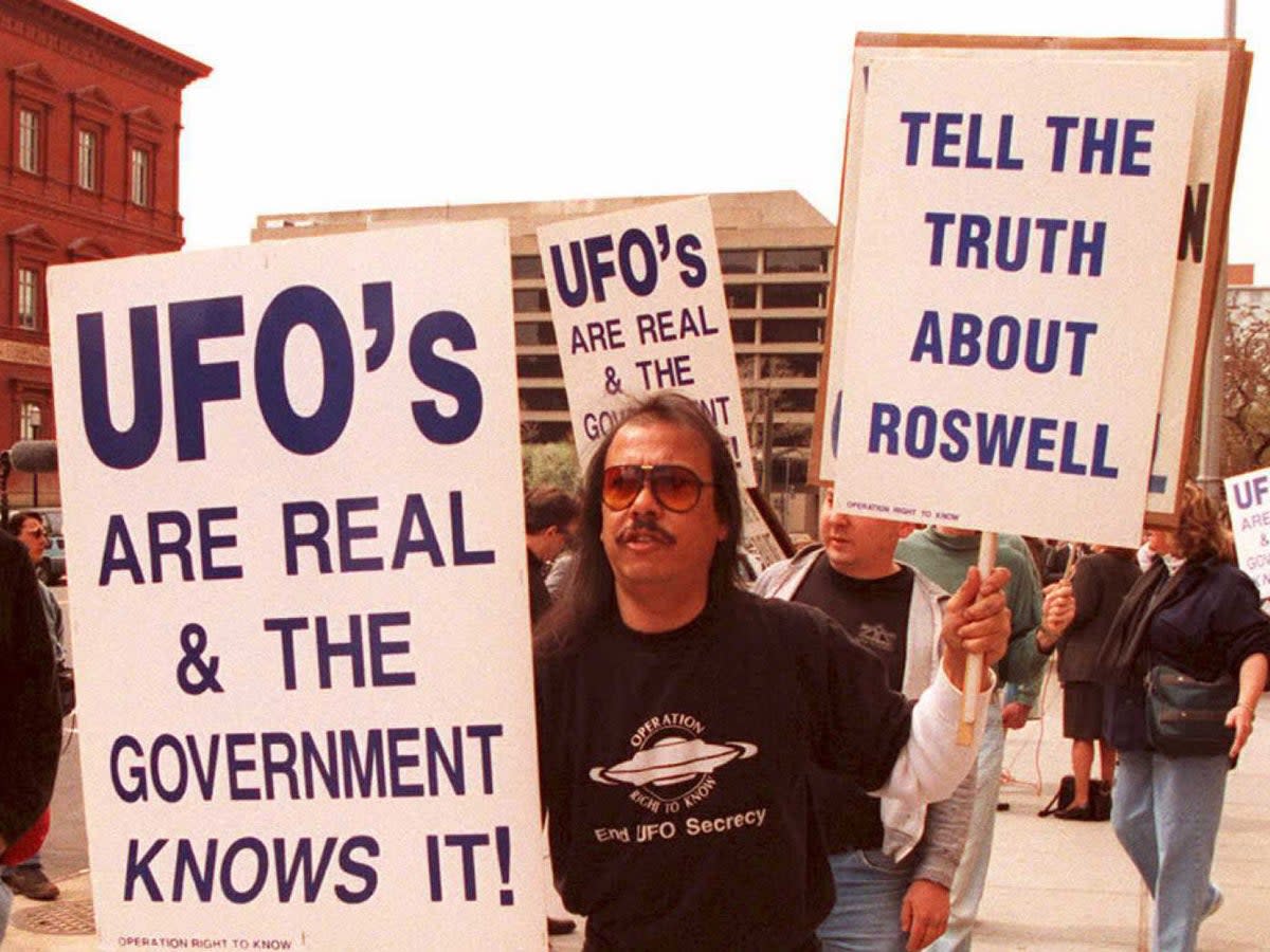 Protestors demand to know about the crash at Roswell in 1947, which they believe was a UFO (AFP)