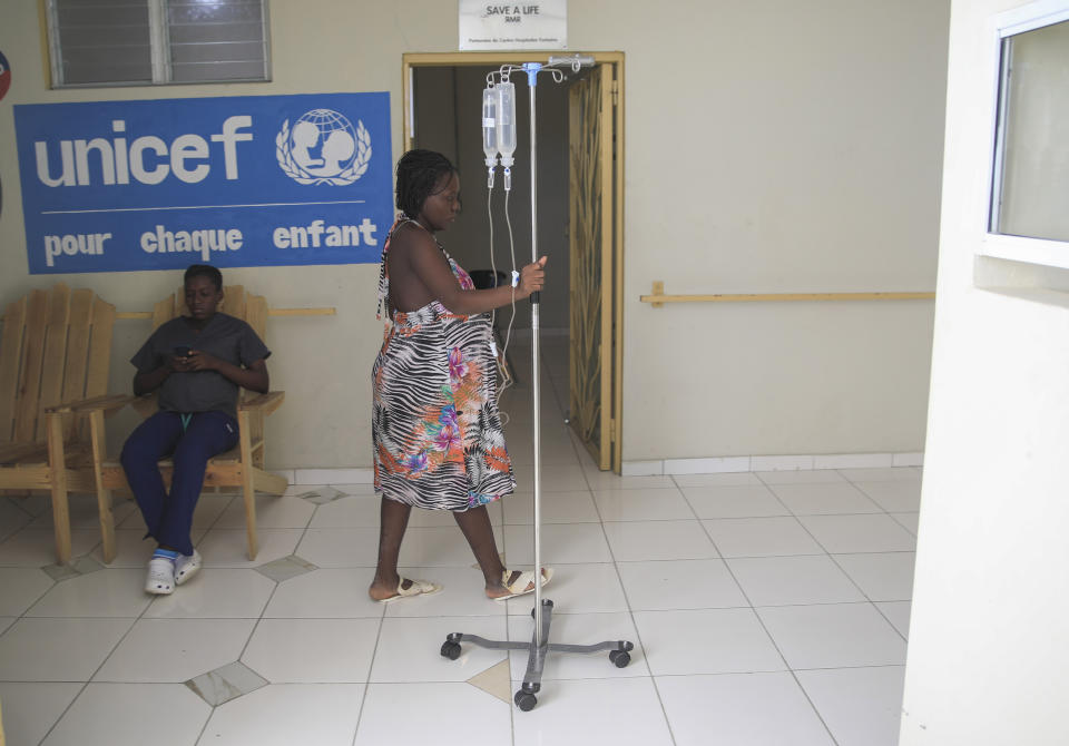 A pregnant woman walks to help encourage a contraction at the Fontaine Hospital Center in the Cité Soleil area of Port-au-Prince, Haiti, Monday, Jan. 23, 2023. As gangs tighten their grip on Haiti, many medical facilities in the Caribbean nation's most violent areas have closed, leaving Fontaine as one of the last hospitals and social institutions in one of the world's most lawless places. (AP Photo/Odelyn Joseph)