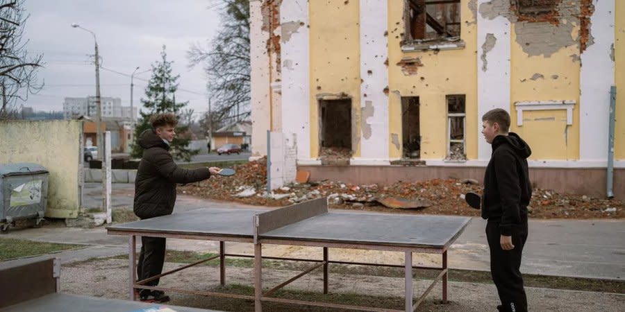 Stepan and Yaroslav near the destroyed school