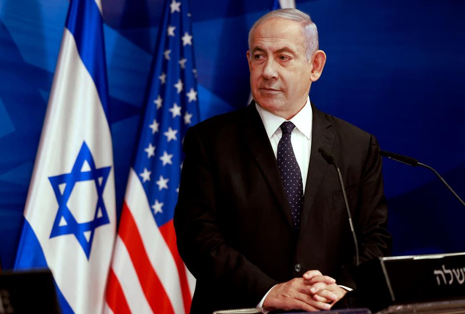 Benjamin Netanyahu watches US Secretary of State Anthony Blinken during a joint press conference in Jerusalem after an Egypt-brokered truce halted fighting (AFP via Getty Images)