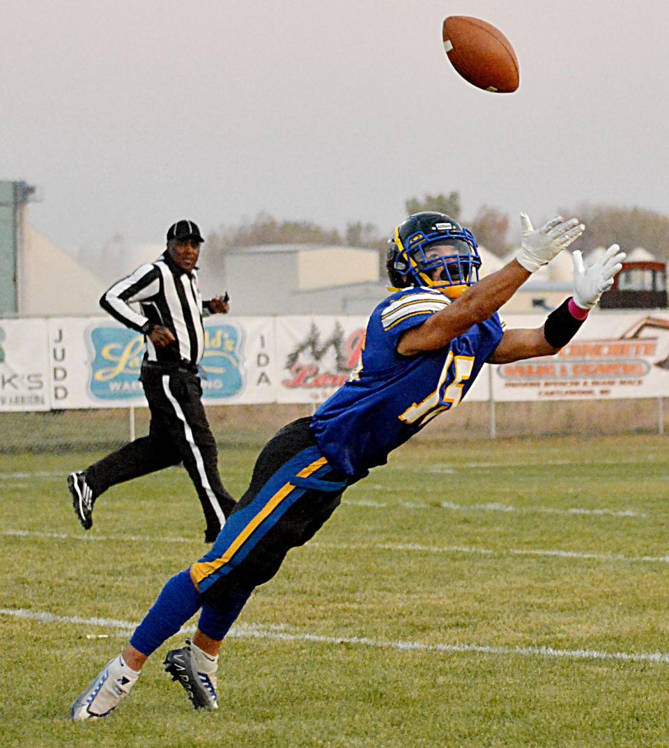 Castlewood's Quincy Thu makes a diving attempt to haul in a long pass during a Class 9A first-round high school football playoff game against Timber Lake last week in Castlewood. The Warriors visit Lyman in a Class 9A quarterfinal game on Thursday, Oct. 27, 2022 at 6 p.m. in Presho.