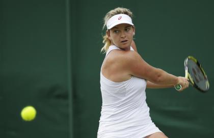 Coco Vandeweghe of the United States returns a shot to Karolina Pliskova of the Czech Republic during the women&#39;s singles match, at the All England Lawn Tennis Championships in Wimbledon, London, Wednesday July 1, 2015. (AP Photo/Pavel Golovkin)