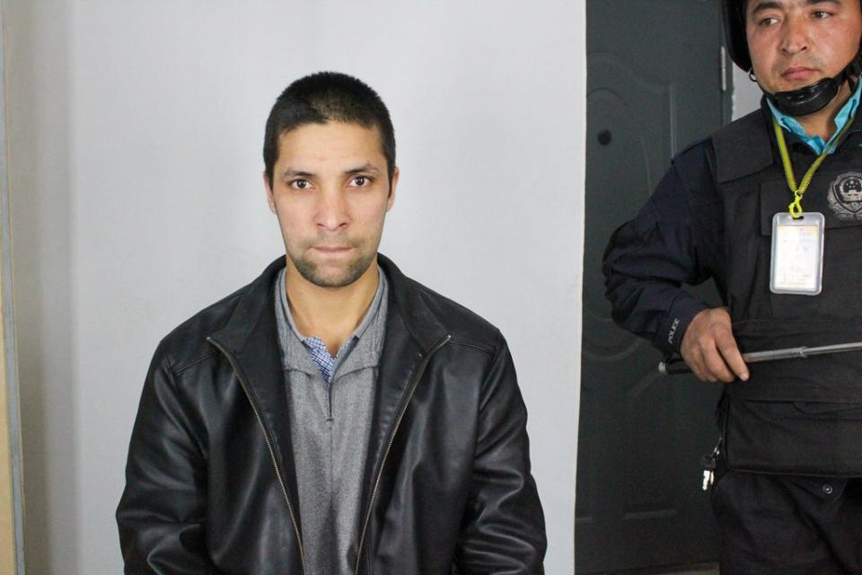 Inmate Ilham Ismayil, 27 - the files state that the reason for his detention is unknown. This image is one of several in which guards armed with batons are seen in the background (Victims of Communism Memorial Foundation/Supplied)