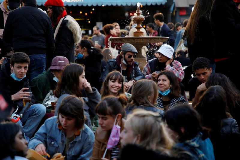 FILE PHOTO: French cafes and restaurants reopen their terraces to customers in Paris