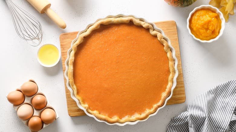 Pumpkin pie and ingredients