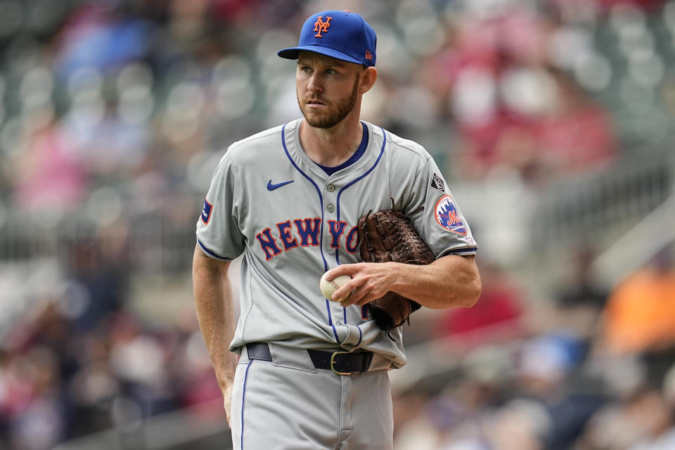 New York Mets pitcher Tyler Jay (74) walks on the mound during his MLB debut in the nineth inning of a baseball game against the Atlanta Braves, Thursday, April 11, 2024, in Atlanta. (AP Photo/Mike Stewart)