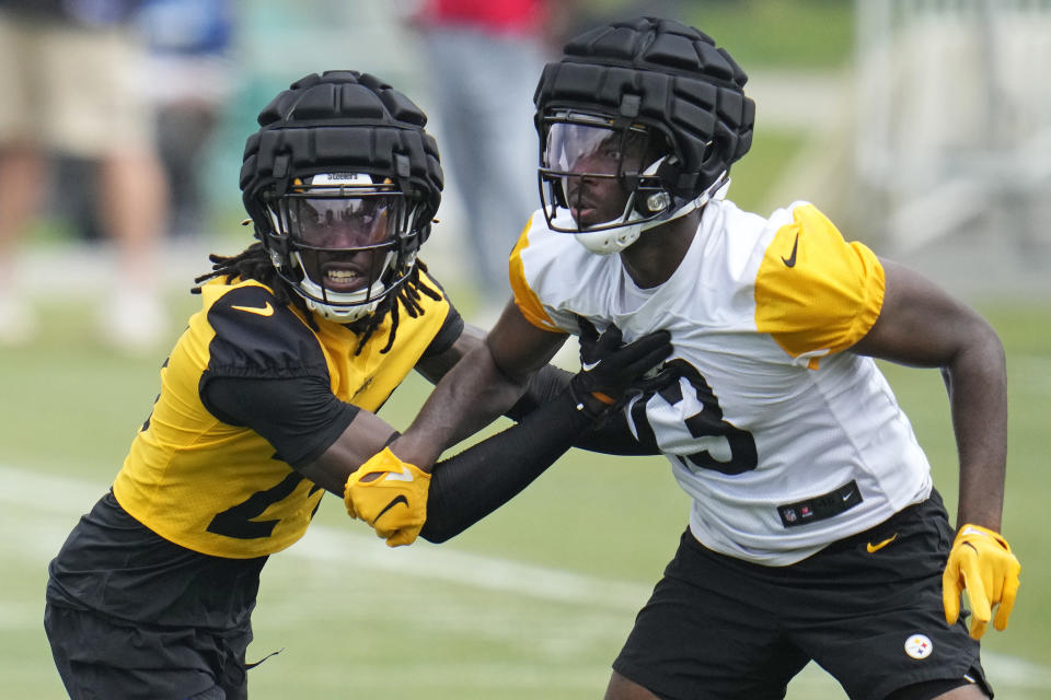 Pittsburgh Steelers cornerback Joey Porter Jr., left, defends against wide receiver Miles Boykin during the NFL football team's training camp in Latrobe, Pa., Thursday, July 27, 2023. (AP Photo/Gene J. Puskar)