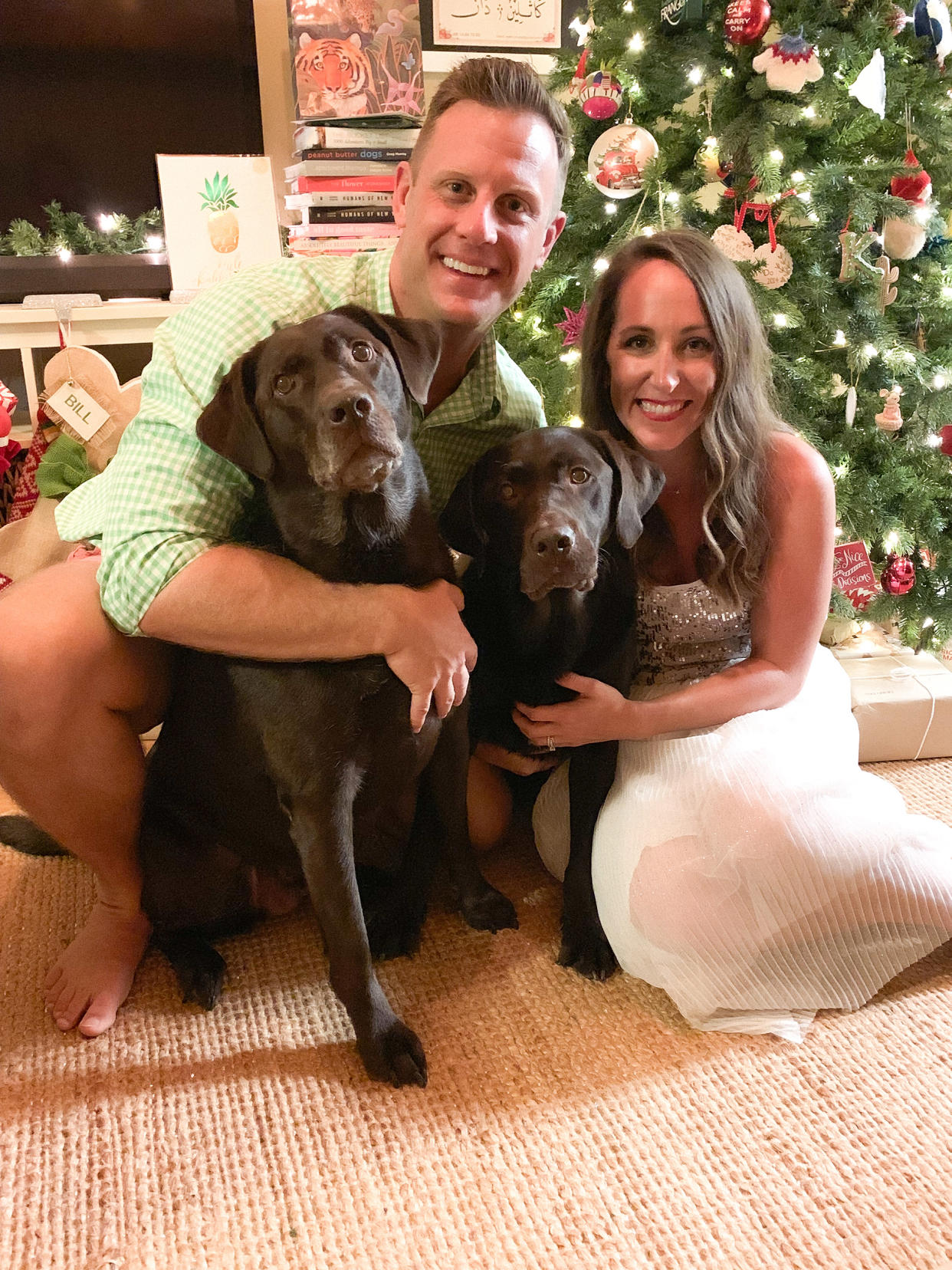 The writer with her husband, Dane, and dogs, Judy and Bill. (Kait Hanson)