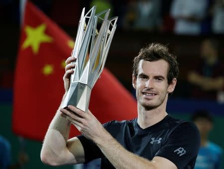 Tennis - Shanghai Masters tennis tournament final - Roberto Bautista Agut of Spain v Andy Murray of Britain - Shanghai, China - 16/10/16. Murray holds the trophy after winning tournament. REUTERS/Aly Song