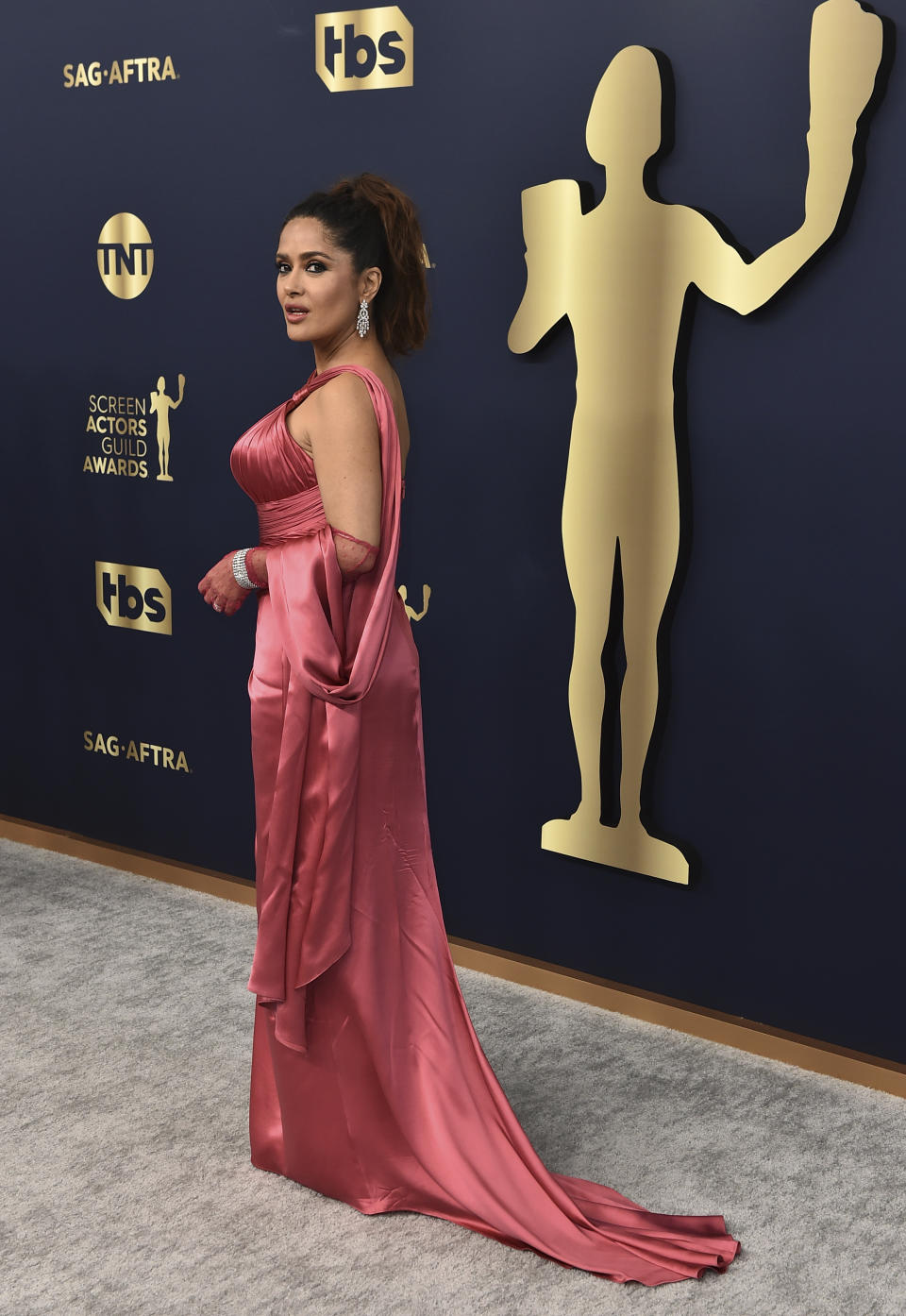 Salma Hayek arrives at the 28th annual Screen Actors Guild Awards at the Barker Hangar on Sunday, Feb. 27, 2022, in Santa Monica, Calif. (Photo by Jordan Strauss/Invision/AP)