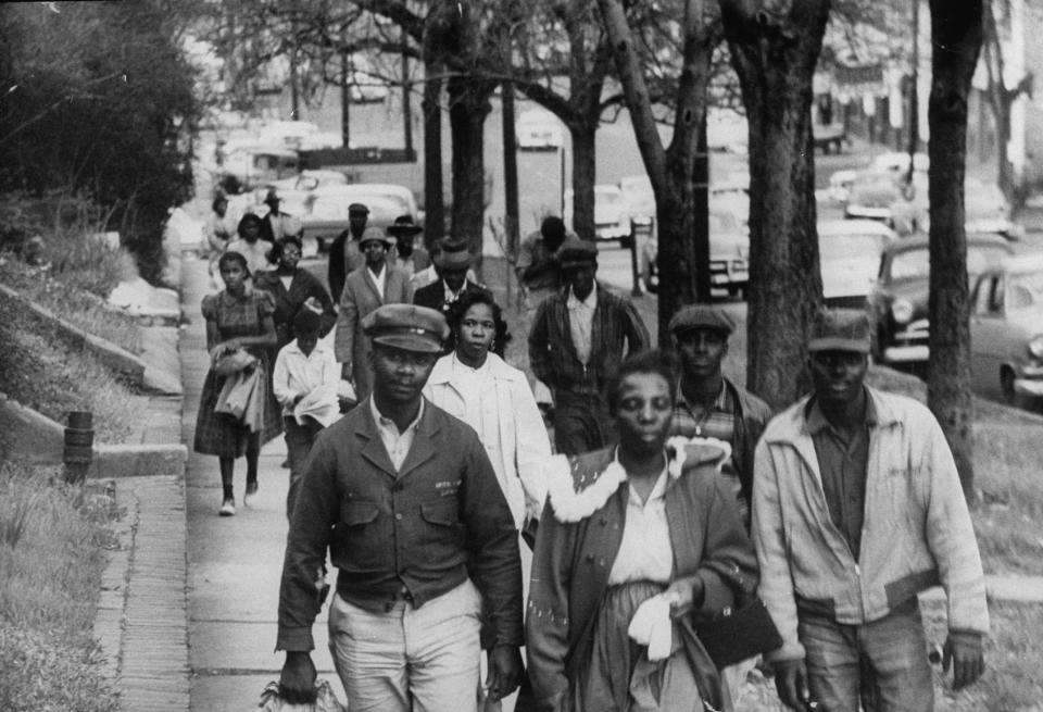 African Americans walked to work instead of riding the bus during the third month of an eventual 381-day bus boycott, Montgomery, Alabama, February 1956.