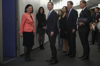 Facebook CEO Mark Zuckerberg, center, is greeted by European Commissioner for Values and Transparency Vera Jourova, left, prior to a meeting at EU headquarters in Brussels, Monday, Feb. 17, 2020. (AP Photo/Francisco Seco)