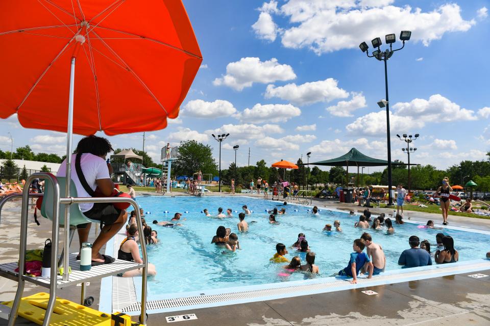 Kids cool off in the water on Wednesday, June 9, 2021, at the Drake Springs Family Aquatic Center in Sioux Falls. 