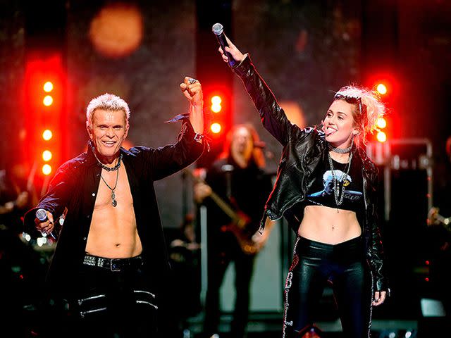 Kevin Winter/Getty Images Billy Idol and Miley Cyrus performing in Las Vegas in September 2016