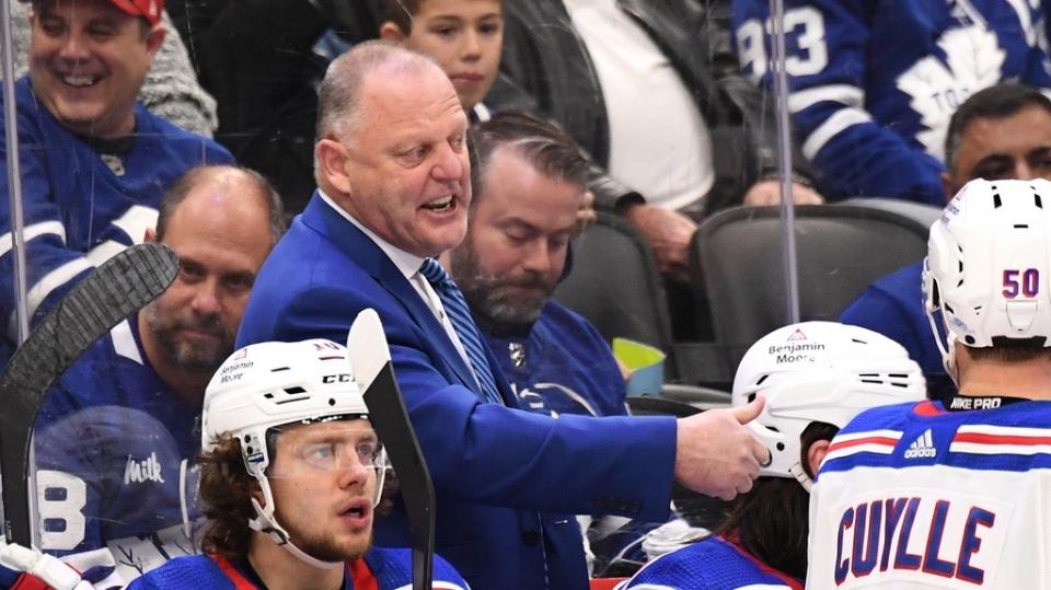 Jan 25, 2023; Toronto, Ontario, CAN; New York Rangers head coach Gerrard Gallant speaks with his players during a break in play against the Toronto Maple Leafs in the third period at Scotiabank Arena.