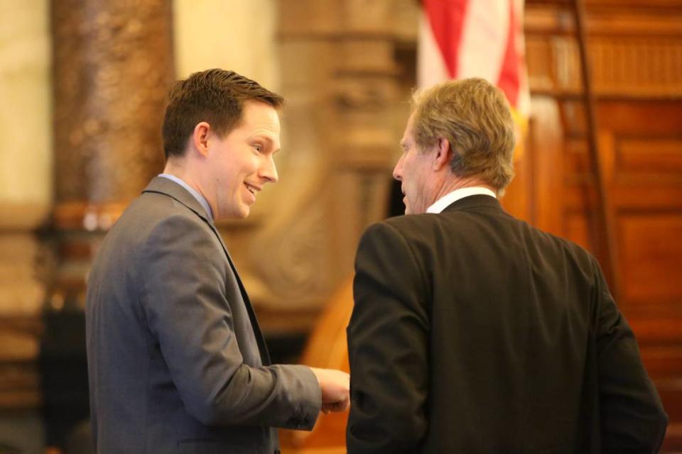 Sen. Chase Blasi, R-Wichita, left, talks with Sen. Rick Billinger, R-Goodland 032923_BlasiBillinger