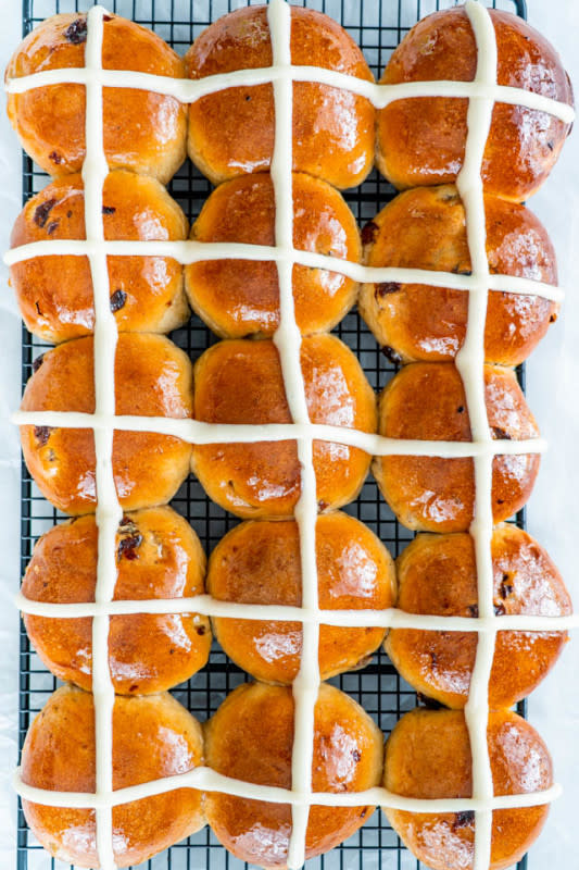 <p>Jo Cooks</p><p>Traditional hot cross buns with cream cheese icing brushed with sweet syrup and filled with juicy raisins. Soft, fluffy, sweet and sticky, a must-have for Easter brunch.</p><p><strong>Get the recipe: <a href="https://www.jocooks.com/recipes/hot-cross-buns/" rel="nofollow noopener" target="_blank" data-ylk="slk:Hot Cross Buns;elm:context_link;itc:0;sec:content-canvas" class="link ">Hot Cross Buns</a></strong></p>