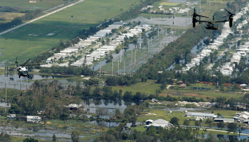 Marine One was accompanied by a U.S. Marines tilt rotor "Osprey" helicopter while touring storm damage.&nbsp;