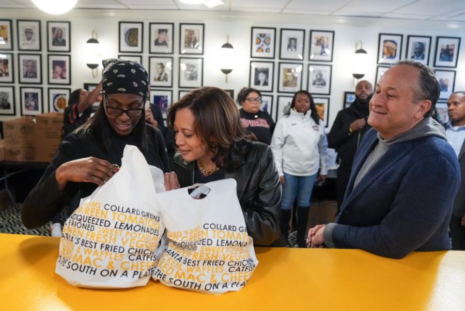 Vice President Kamala Harris (center) visited The Busy Bee, a Black-owned soul food restaurant in Atlanta, with her husband, Doug Emhoff, after attending Saturday’s HBCU Cricket Celebration Bowl game between her alma mater, Howard University, and Florida A&M. (Photo: Courtesy of the Office of the Vice President)