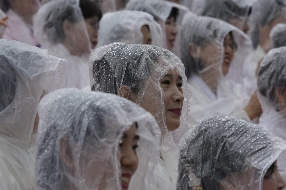 Buddhists wait for a lantern parade during the Lotus Lantern Festival, ahead of the birthday of Buddha at Dongguk University in Seoul, South Korea, Saturday, May 11, 2024. (AP Photo/Ahn Young-joon)