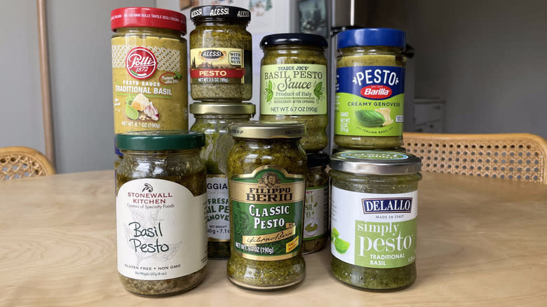 jars of pesto stacked on table