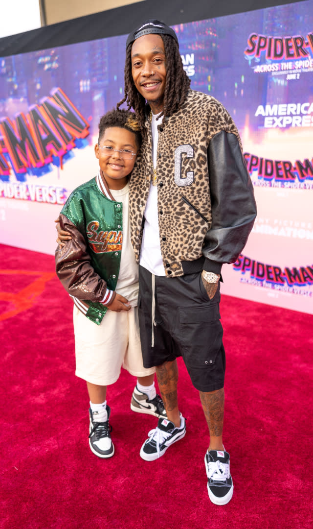 Wiz Khalifa and son Sebastian Taylor Thomaz at the premiere of “Spider-Man: Across the Spider-Verse” held at Regency Village Theatre on May 30, 2023 in Los Angeles, California. <em>Photo by Christopher Polk/Variety via Getty Images.</em>