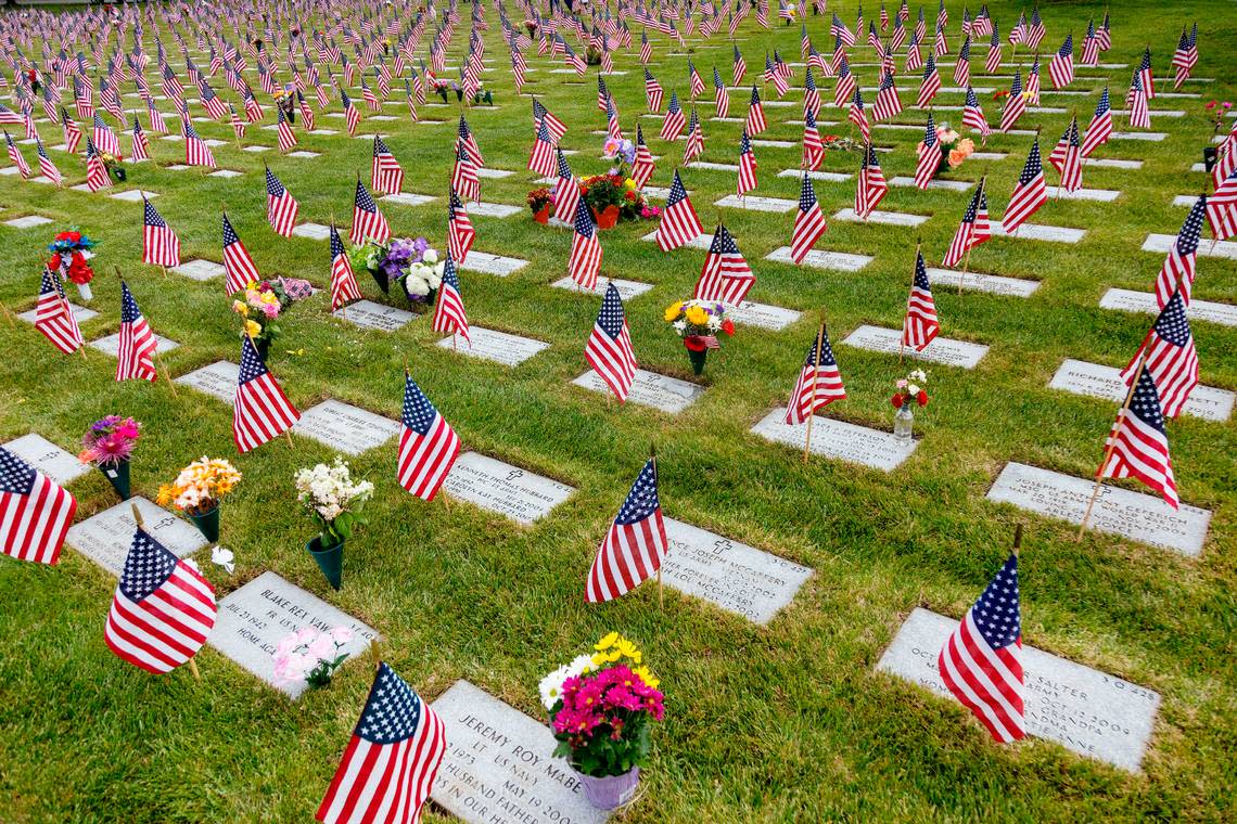 Graves of U.S. Armed Forces members are decorated in honor of Memorial Day at Idaho State Veterans Cemetery on Saturday, May 28, 2022.