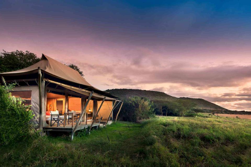 <p>Courtesy of andBeyond</p> A tent at Kichwa Tembo Tented Camp, in Kenya. 