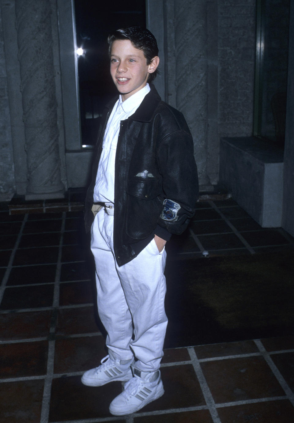 A young Omri photographed at an event