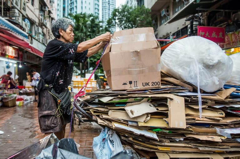 Au Fung-lan is one of some 2,900 cardboard collectors, mainly older women, who are a familiar sight in Hong Kong