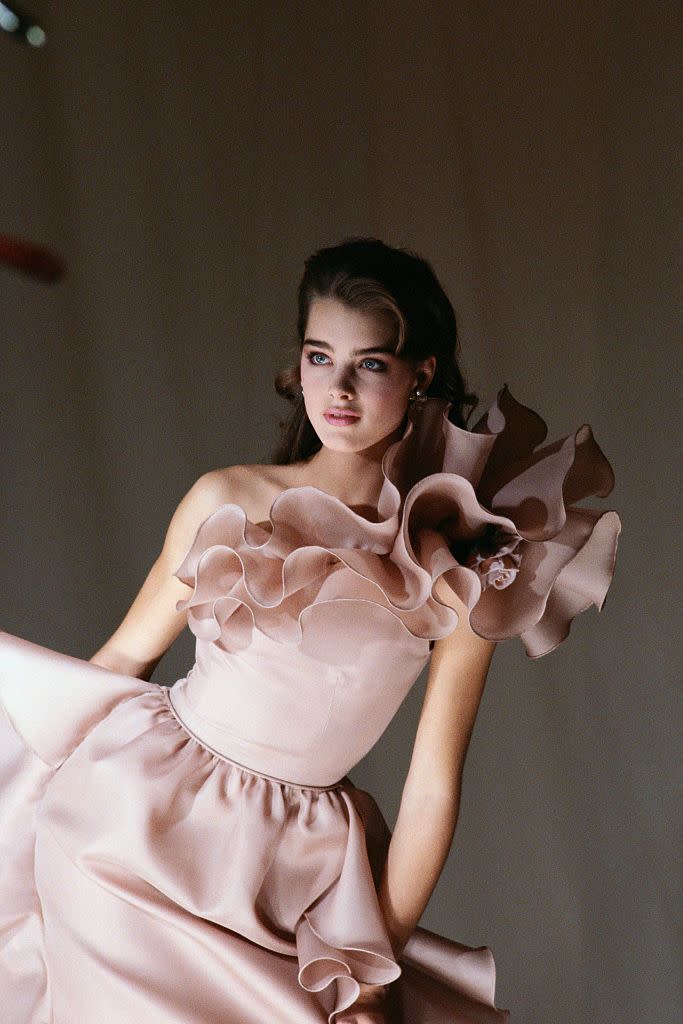 <p>In 1980, Brooke Shields graduated from child star to bonafide supermodel. At just 14 years old, she became the youngest model to ever grace the cover of <em>Vogue</em>. Later that same year, she appeared in a controversial ad campaign for Calvin Klein jeans. </p>