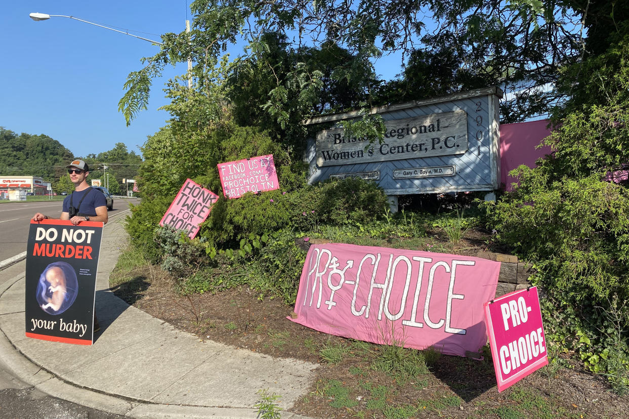 Haven Hensley stands outside the Bristol Regional Women’s Center, an OB-GYN practice in Bristol, Tennessee, that offers abortions. A Tennessee state law that bans the procedure in most cases is set to take effect in late August. (Sam Whitehead / KHN)