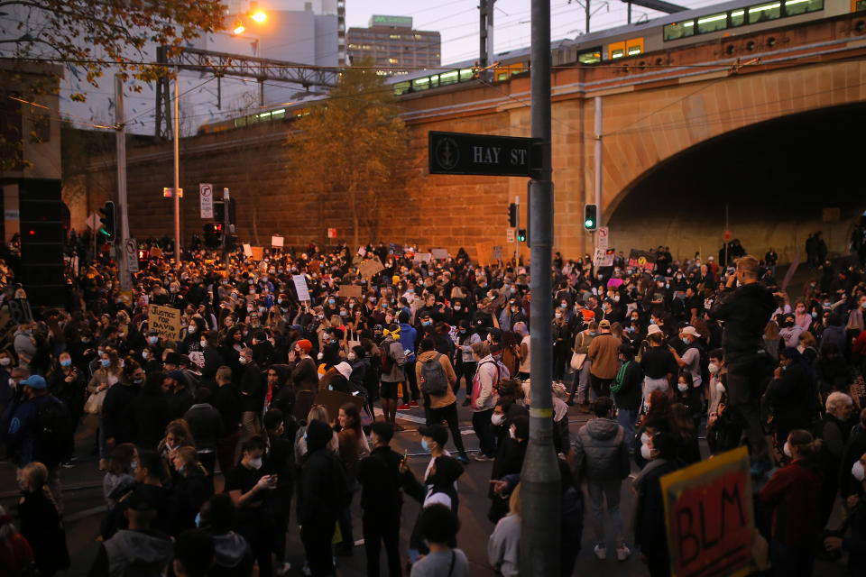 SYDNEY, AUSTRALIA - JUNE 6: Protesters participate in a protest in Sydney to show solidarity with Black Lives Matter demonstrations in the US, which were sparked by the death of George Floyd and rally to stop Aboriginal deaths in custody after an appeal court's last-minute decision to authorise the public gathering in Australia on June 6, 2020. (Photo by Steven Saphore/Anadolu Agency via Getty Images)