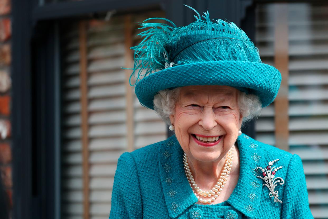 Britain's Queen Elizabeth II visits the set of the long running television series Coronation Street, in Manchester, England, July 8, 2021. 