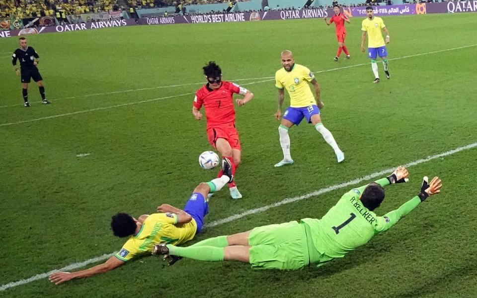 Marquinhos completes a double-block to keep out Son Heung-min (Getty Images)