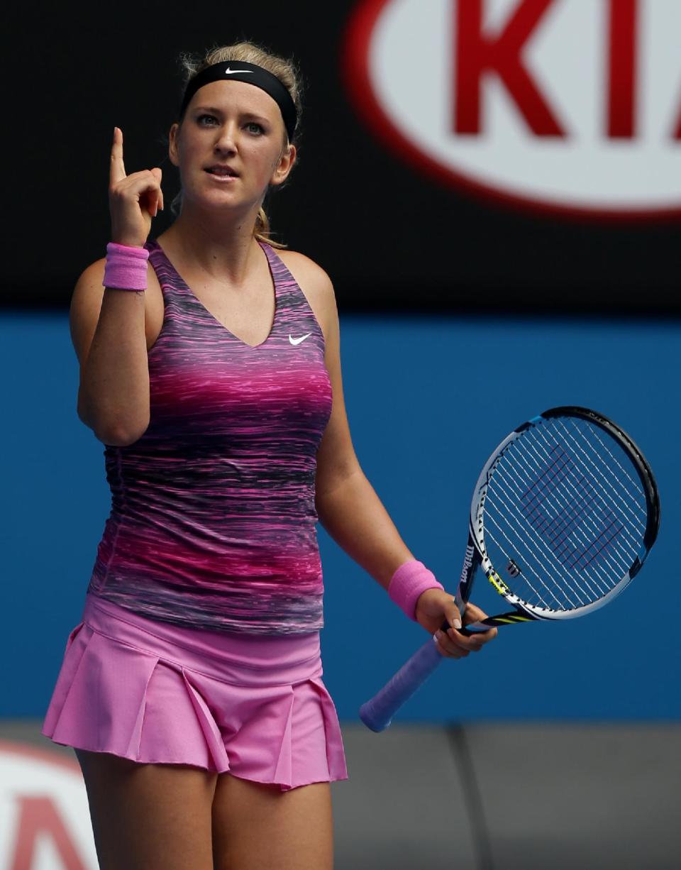 Victoria Azarenka of Belarus celebrates after defeating Sloane Stephens of the U.S. in their fourth round match at the Australian Open tennis championship in Melbourne, Australia, Monday, Jan. 20, 2014.(AP Photo/Aaron Favila)